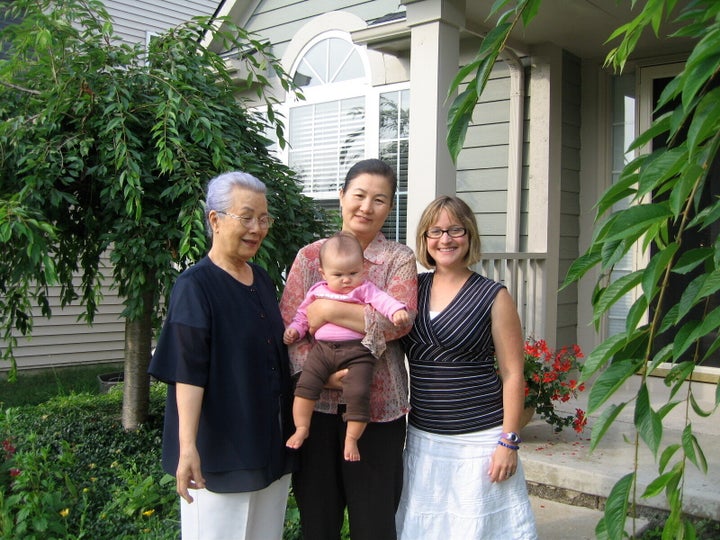 Kendra Stanton Lee (right) with her daughter, Madigan, and Madigan's great-grandmother Myung Namm (far left) and grandmother Mi Ja Lee, in 2008.