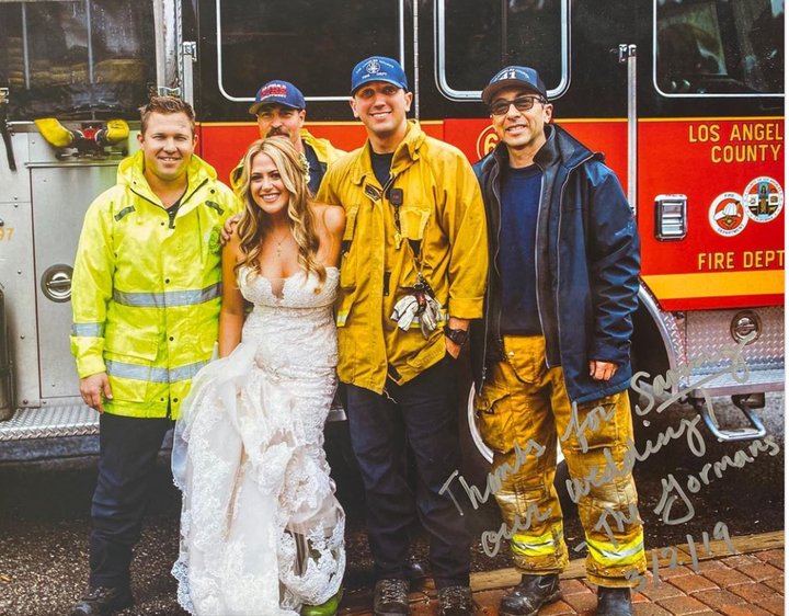 Firefighters gave this bride and her bridesmaids a ride to the wedding after their limo was stuck in traffic due to a car accident.