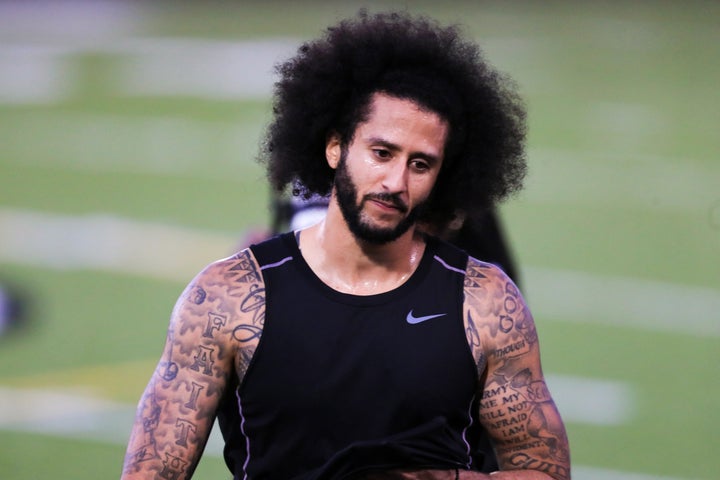 RIVERDALE, GA - NOVEMBER 16: Colin Kaepernick looks on during the Colin Kaepernick NFL workout held at Charles R. Drew High School on November 16, 2019 in Riverdale, Georgia. (Photo by Carmen Mandato/Getty Images)