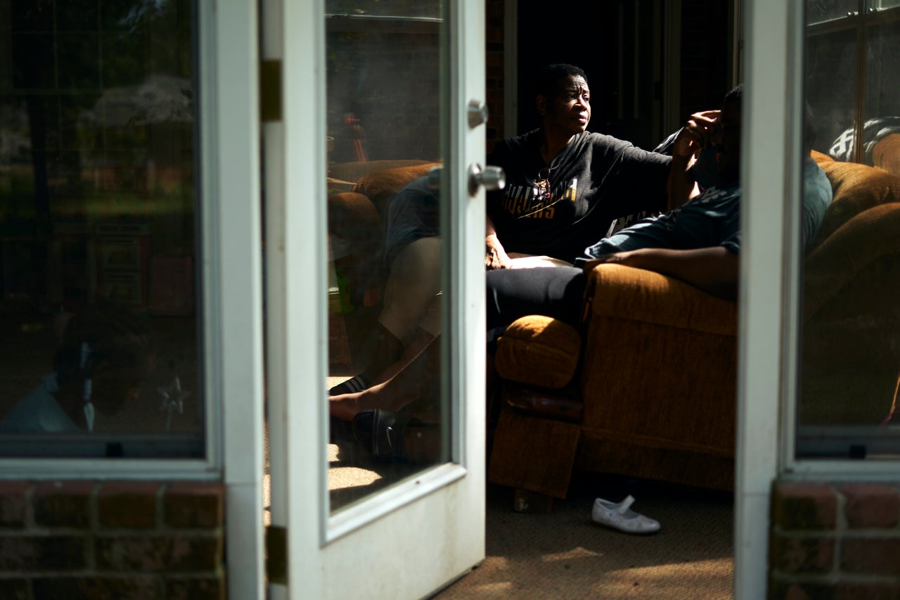 Rosie Phillips talks with her son, J.H., in the sunroom at their home in Shreveport, Louisiana, on Aug. 25, 2019.