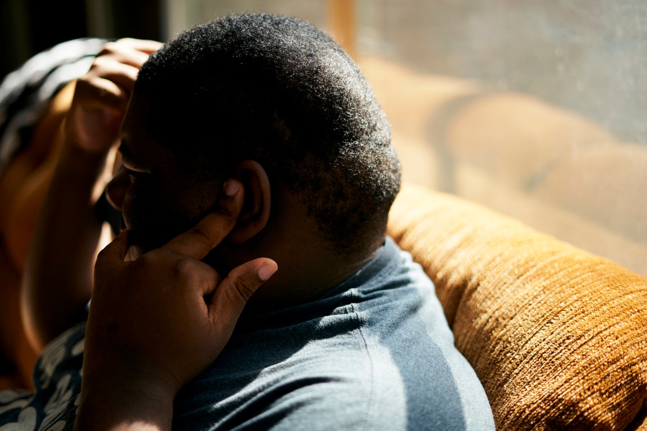 J.H. listens to music on his iPad in the sunroom at his home in Shreveport.