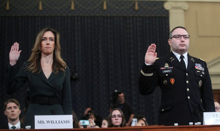 Jennifer Williams, a special adviser to Vice President Mike Pence for European and Russian affairs; and Alexander Vindman, director for European Affairs at the National Security Council, are sworn in to testify before a House Intelligence Committee hearing as part of the impeachment inquiry into U.S. President Donald Trump, Nov. 19, 2019.