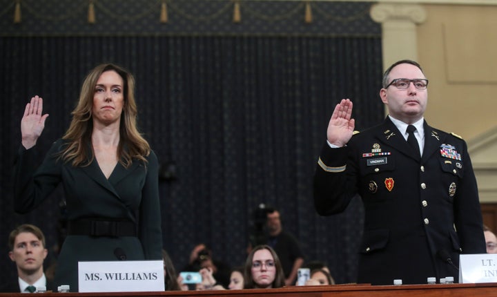 Jennifer Williams, a special adviser to Vice President Mike Pence for European and Russian affairs; and Alexander Vindman, director for European Affairs at the National Security Council, are sworn in to testify before a House Intelligence Committee hearing as part of the impeachment inquiry into U.S. President Donald Trump, Nov. 19, 2019.