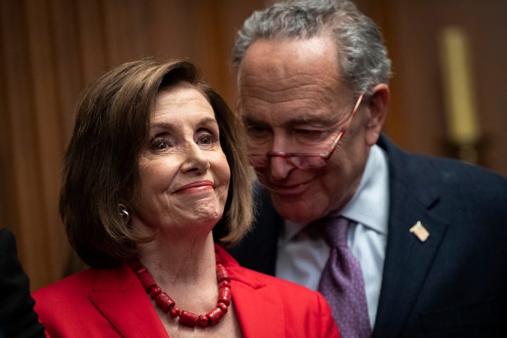 House Speaker Nancy Pelosi (D-Calif.) and Senate Minority Leader Chuck Schumer (D-N.Y.) speak with each other at a news conference with Deferred Action for Childhood Arrivals recipients to discuss the Supreme Court case concerning the program on Nov. 12, 2019, in Washington, D.C.