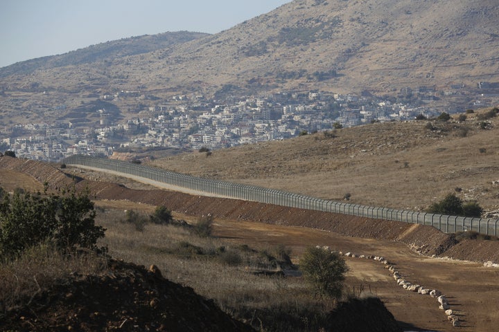 A picture taken on November 19, 2019 shows the Israeli fence separating the Israeli-occupied sector of the Golan Heights and