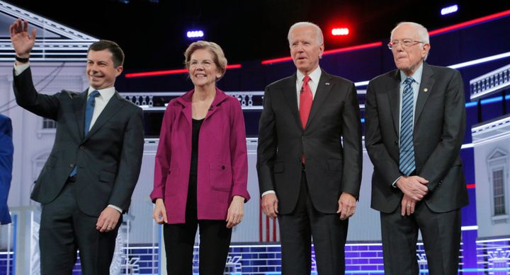 From left, the four polling leaders -- Pete Buttigieg, Elizabeth Warren, Joe Biden and Bernie Sanders -- did not get into the contentious clashes that had been expected.