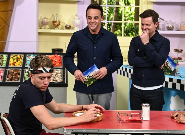 Ant and Dec stand by as Roman Kemp tucks into his Bushtucker Trial food