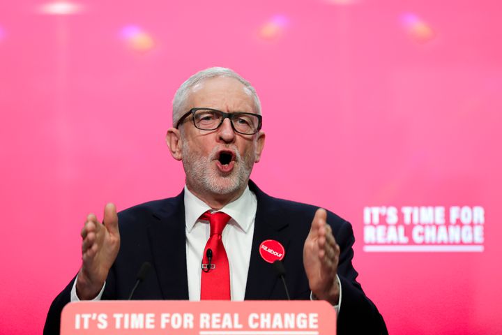 Jeremy Corbyn, Leader of Britain's opposition Labour Party speaks on stage at the launch of Labour's General Election manifesto, at Birmingham City University, England, Thursday, Nov. 21, 2019. Britain goes to the polls on Dec. 12. (AP Photo/Kirsty Wigglesworth)