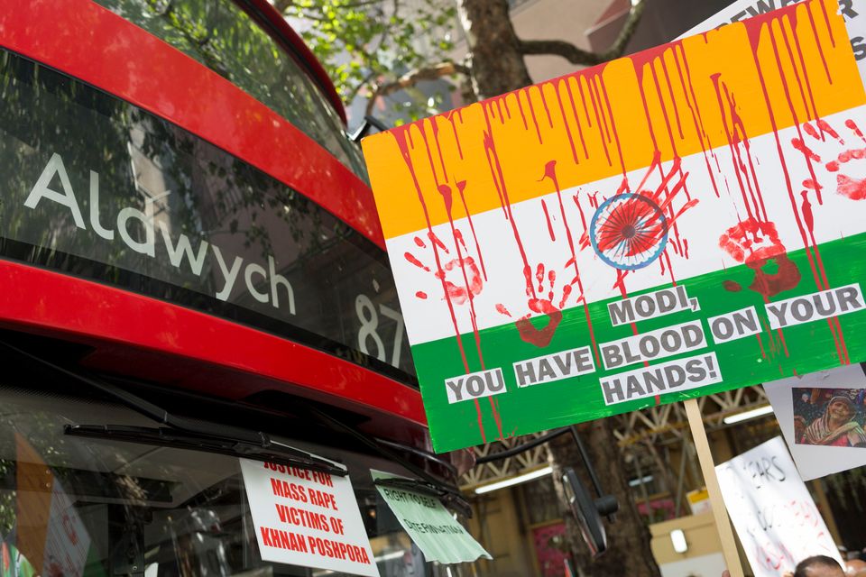 Kashmiris and Pakistanis protest outside India House, the Indian High Commission in London's Aldwych in August