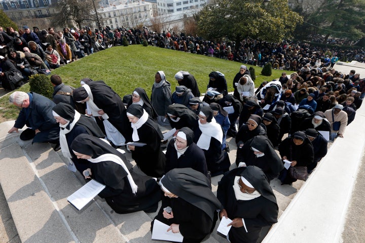 Catholic nuns attend the annual Good Friday "Stations of the Cross" procession in the gardens of the Montmartre's Sacre Coeur Basilica in Paris in March 2013.
