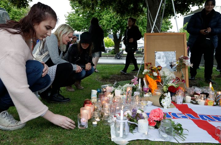 People pay respects during candlelight vigil for murdered British tourist Grace Millane.