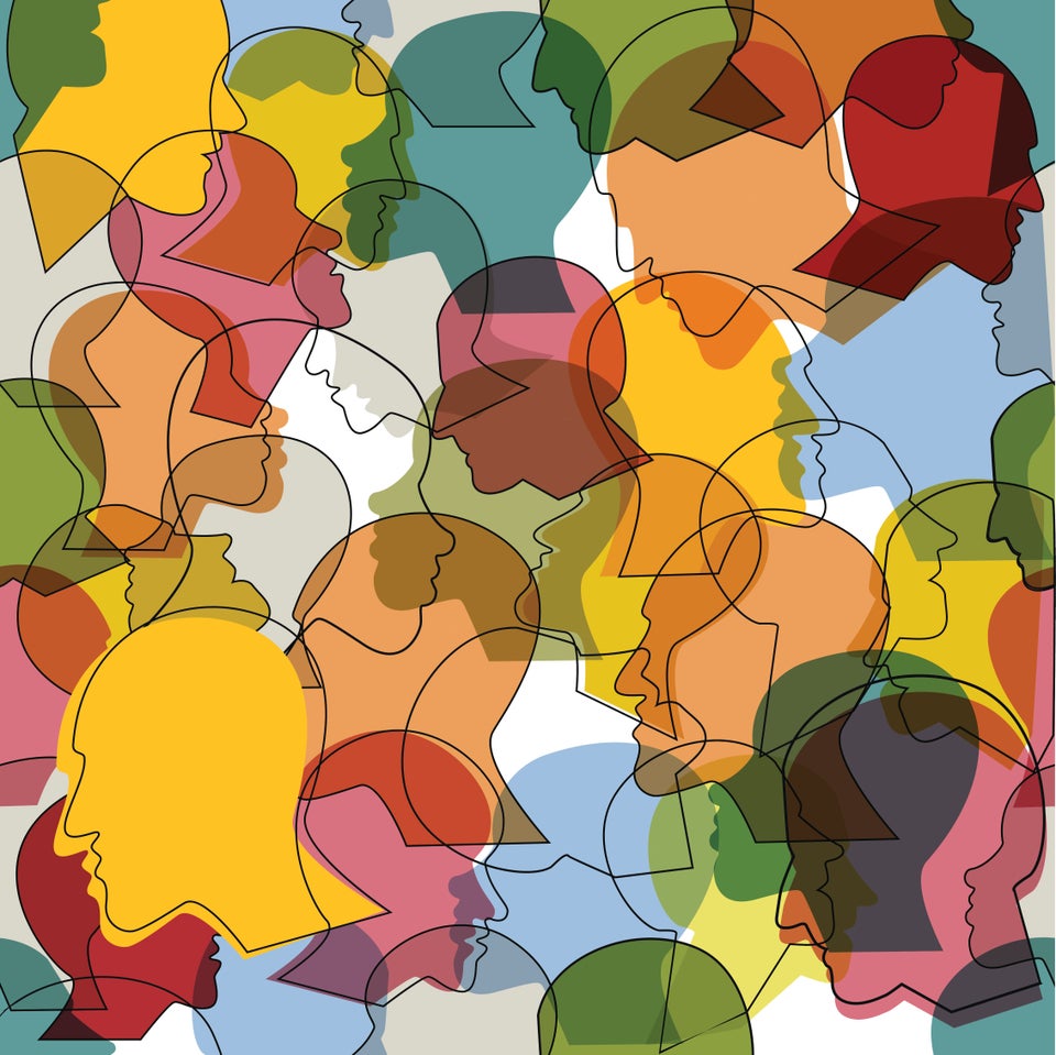 Seamless pattern of a crowd of many different people profile heads. Vector background.