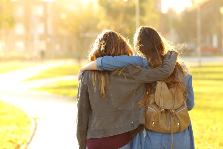 Two friends in a park. 