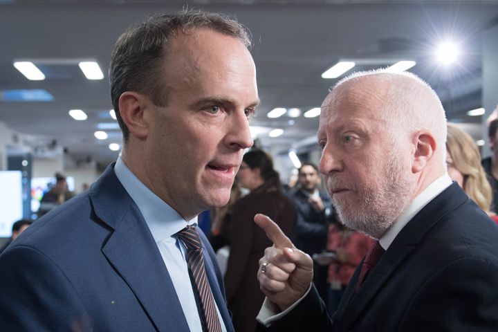 Foreign Secretary Dominic Raab (left) and shadow transport secretary Andy McDonald seen in a heated discussion moments after appearing on live TV. 