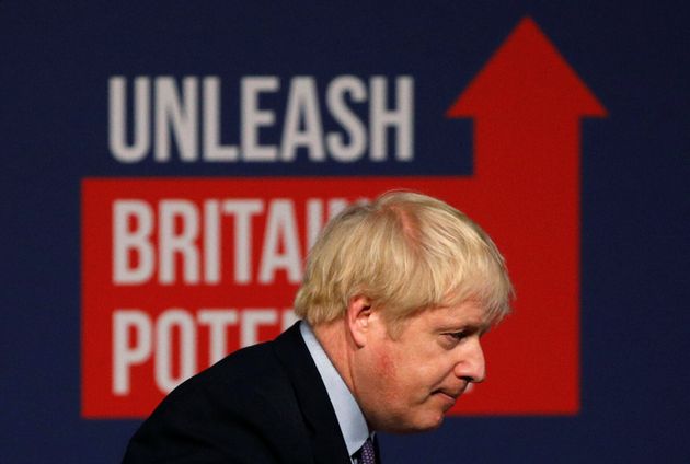 Britain's Prime Minister Boris Johnson leaves after speaking at the Conservative party's manifesto launch in Telford.