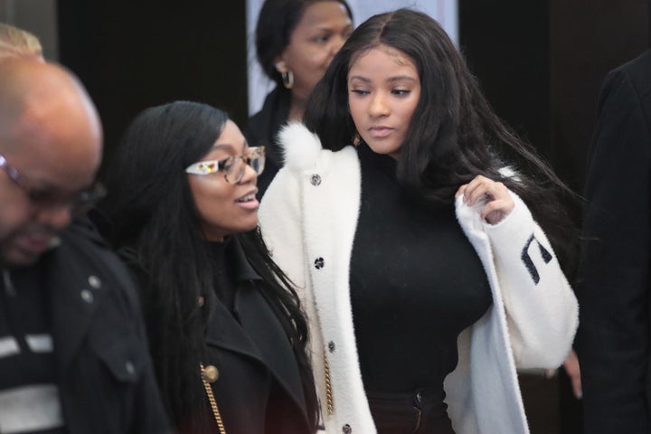 Joycelyn Savage (R) and Azriel Clary arrive for a bond hearing for R&B singer R. Kelly at the Leighton Criminal Court Bui