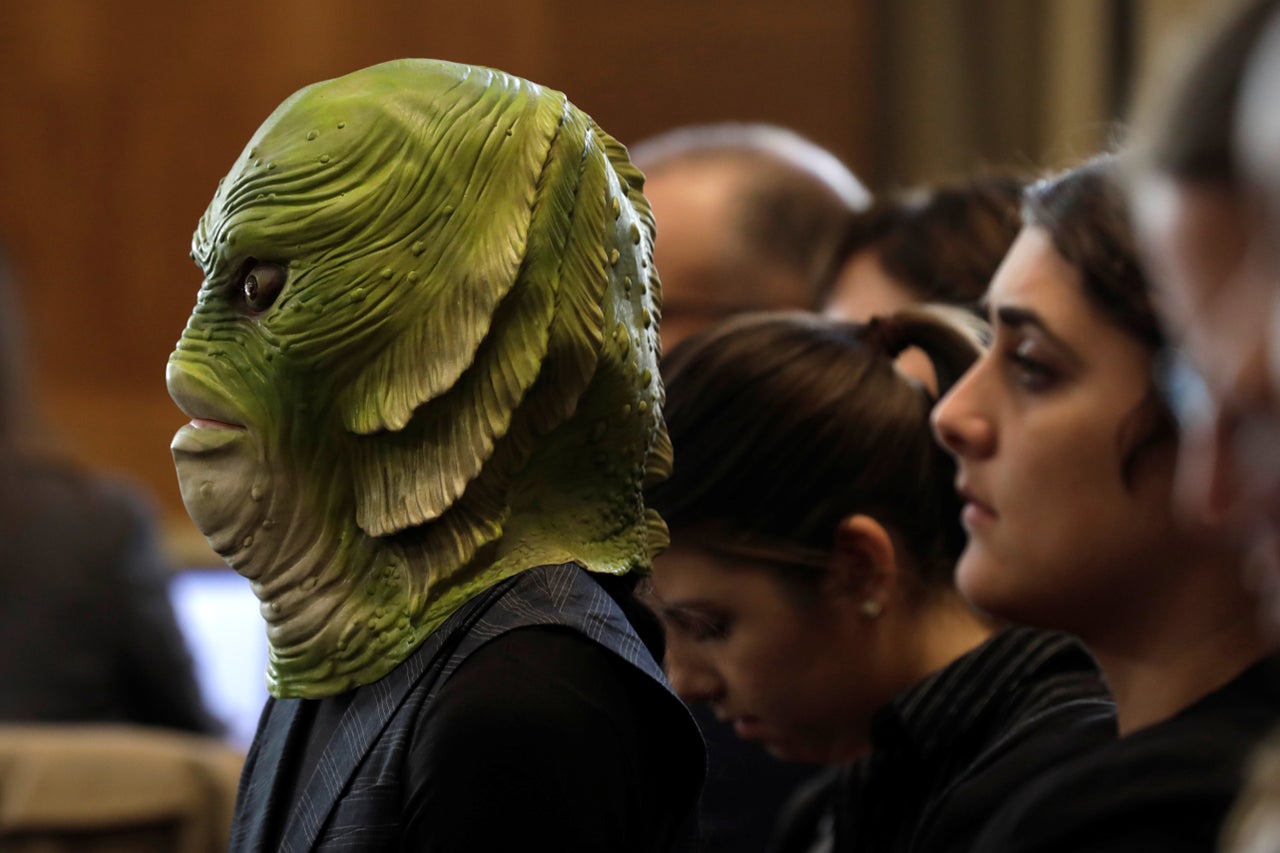 A clean water activist attends a Senate Energy and Natural Resources Committee nomination hearing for former energy lobbyist and now-Interior Secretary David Bernhardt in Washington on March 28, 2019.