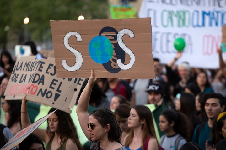Demonstrators take part in a global youth climate action strike.