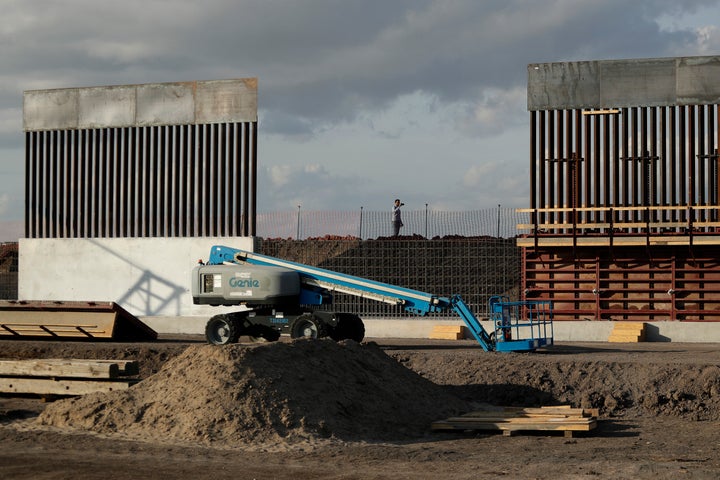 The first panels of levee border wall are seen at a construction site along the U.S.-Mexico border on Nov. 7 in Donna, Texas. The new section, with 18-foot tall steel bollards atop a concrete wall, will stretch about 8 miles.