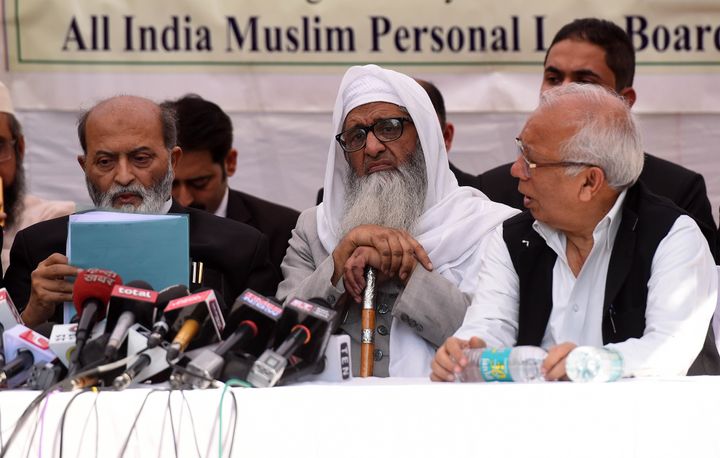 Sunni Central Waqf Board counsel members Zafaryab Jilani (L), All India Muslim Personal Law Board members Maulana Abdul Rahmani (C), and Kamal Farooqui at a press conference after the Supreme Court verdict on November 9, 2019 in New Delhi.