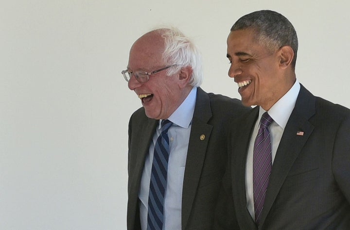 Then-President Barack Obama, right, walks with 2016 Democratic presidential candidate Sen. Bernie Sanders of Vermont at the White House on June 9, 2016.