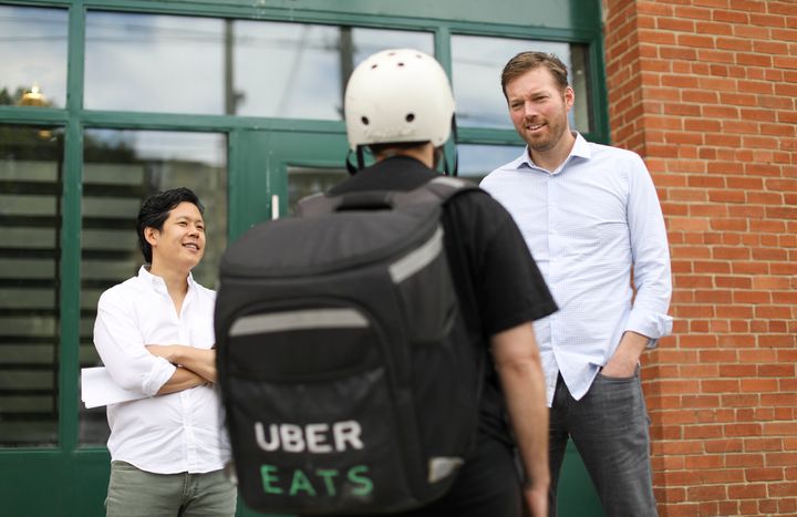 An Uber Eats delivery worker is seen here working in Toronto. A role with Uber is one of the many precarious jobs available for workers across Canada.