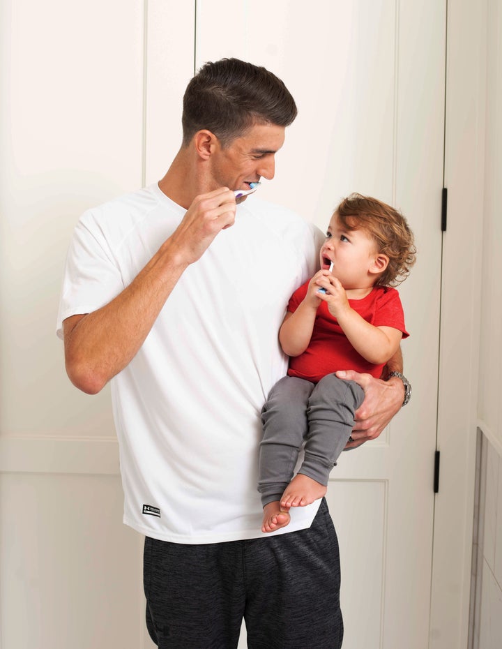 Phelps is teaching his sons about the importance of conserving water.