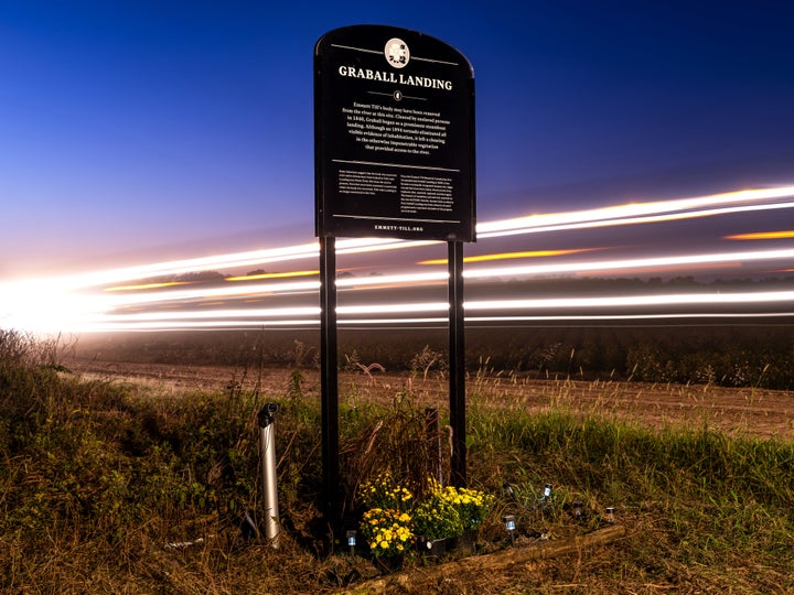 A tractor passes an Emmett Till commemorative marker in Tallahatchie County, Mississippi, that was rededicated Oct. 19 at a ceremony hosted by the Emmett Till Memorial Commission. The new sign is bulletproof.