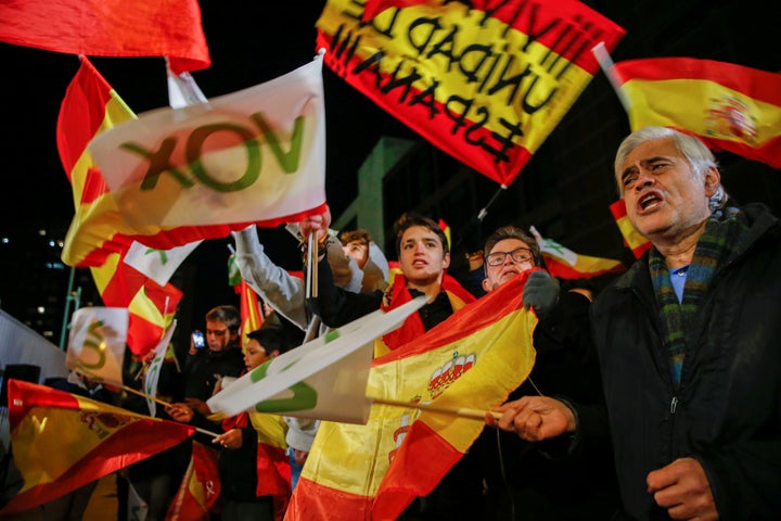 Supporters of Spain's far-right party Vox wave flags in Madrid during the Spanish election in November.