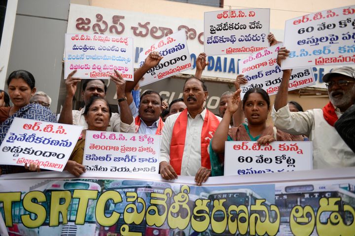 Left parties activists shout slogans during a protest against the state government's order to sack over 40,000 Telangana State Road Transport Corporation (TSRTC) employees in Hyderabad on November 7, 2019. 