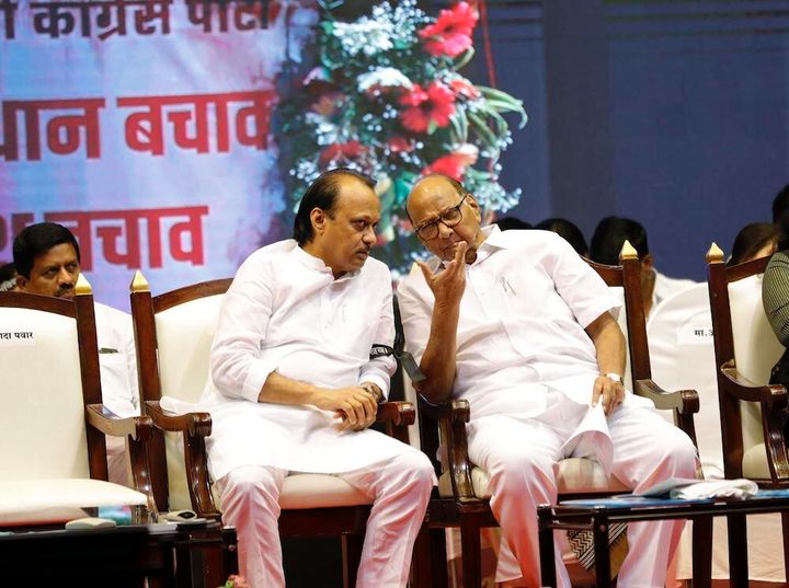 A file photo of Ajit Pawar (left) with uncle Sharad Pawar in Pune.