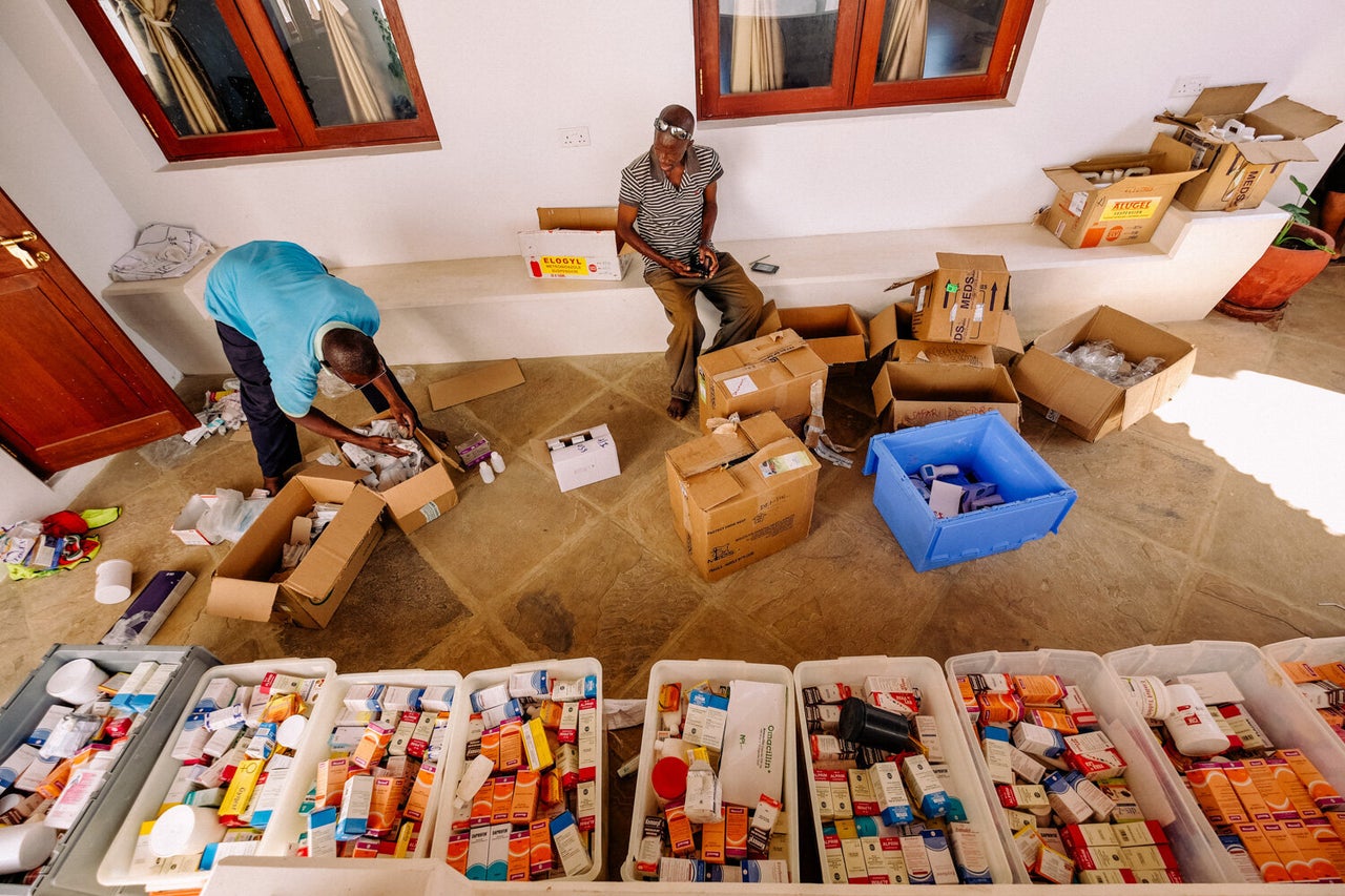 Each trip by Safari Doctors takes several days. Before launching their boat, they pack waterproof boxes with medicines and supplies.