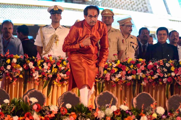 Maharashtra's new chief minister Uddhav Thackeray bows after taking his oath of office during his swearing-in ceremony in Mumbai on November 28, 2019.