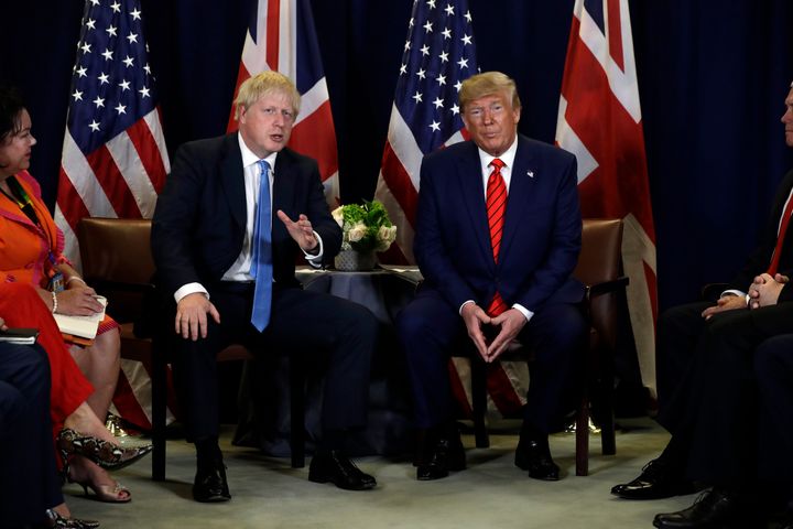 UK Prime Minister Boris Johnson, left, said it was best if U.S. President Donald Trump, right, did not get involved in Britain’s upcoming election when he visits London for a NATO summit next week.