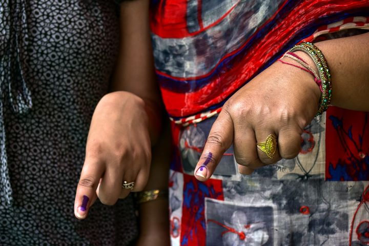 PATIALA, PUNJAB, INDIA - 2019/05/19: Indian voters seen showing their inked fingers after casting their vote at a polling station during the final phase of India's general election in Patiala district of Punjab.Voting has begun for the final phase of Lok Sabha elections in Punjab, Bihar, West Bengal, Madhya Pradesh, Uttar Pradesh, Himachal Pradesh, Jharkhand and Chandigarh. Over 10.01 lakh voters will decide the fate of 918 candidates. The counting of votes will take place on May 23, officials said. (Photo by Saqib Majeed/SOPA Images/LightRocket via Getty Images)