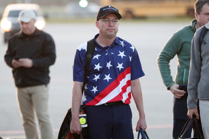 Acting White House chief of staff Mick Mulvaney was photographed descending from Air Force One at Palm Beach International Airport in West Palm Beach, Florida, on Friday.