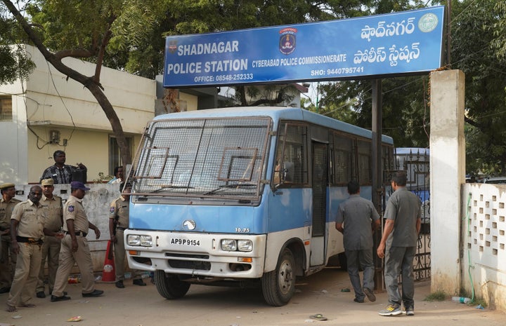 A police van carrying four men accused of the alleged rape and murder of a 27-year-old woman, leaves a police station in Shadnagar, on the outskirts of Hyderabad, India, November 30, 2019. REUTERS/Vinod Babu