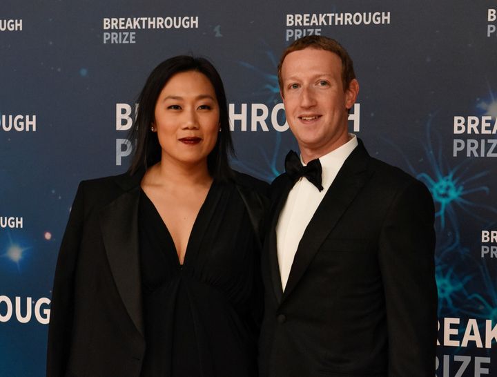 Mark Zuckerberg and his wife, Priscilla Chan, attend the Breakthrough Prize awards in Mountain View, California, in November. The couple has defended Facebook's refusal to ban or fact-check political ads.