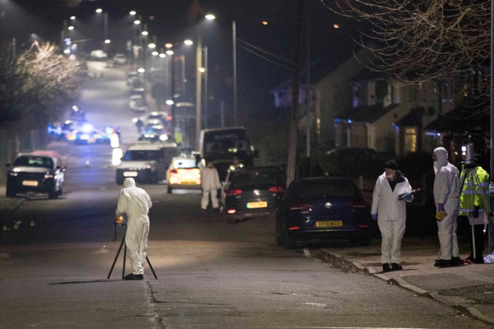 Forensic officers in Willingdale Road near Debden Park High School, in Loughton, Essex.