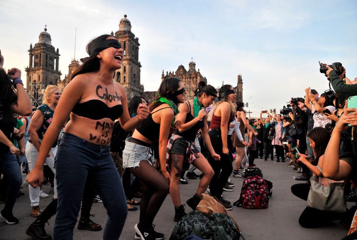 Women recreate a feminist choreographed performance at the Zocalo square in Mexico City, on November 29, 2019.