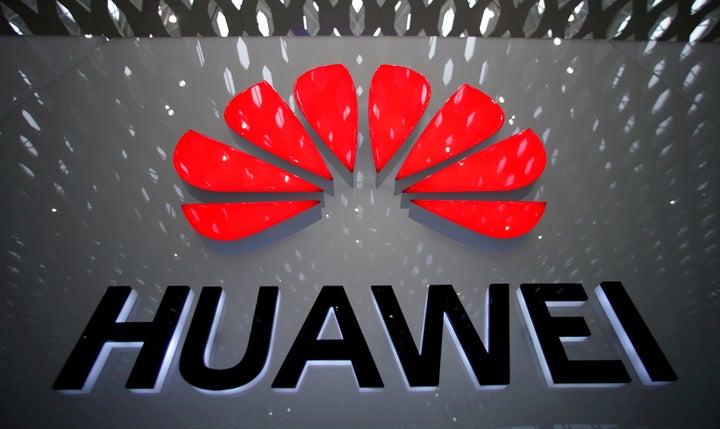 A Huawei sign is displayed at the Shenzhen International Airport in Shenzhen, China, on July 22, 2019. The company's founder says its U.S. research centre will be relocated to Canada as it faces allegations that Huawei products could be used for spying.