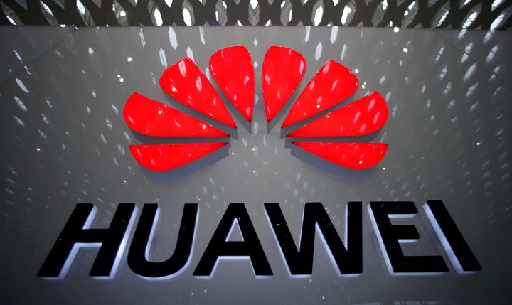 A Huawei sign is displayed at the Shenzhen International Airport in Shenzhen, China, on July 22, 2019. The company's founder says its U.S. research centre will be relocated to Canada as it faces allegations that Huawei products could be used for spying.