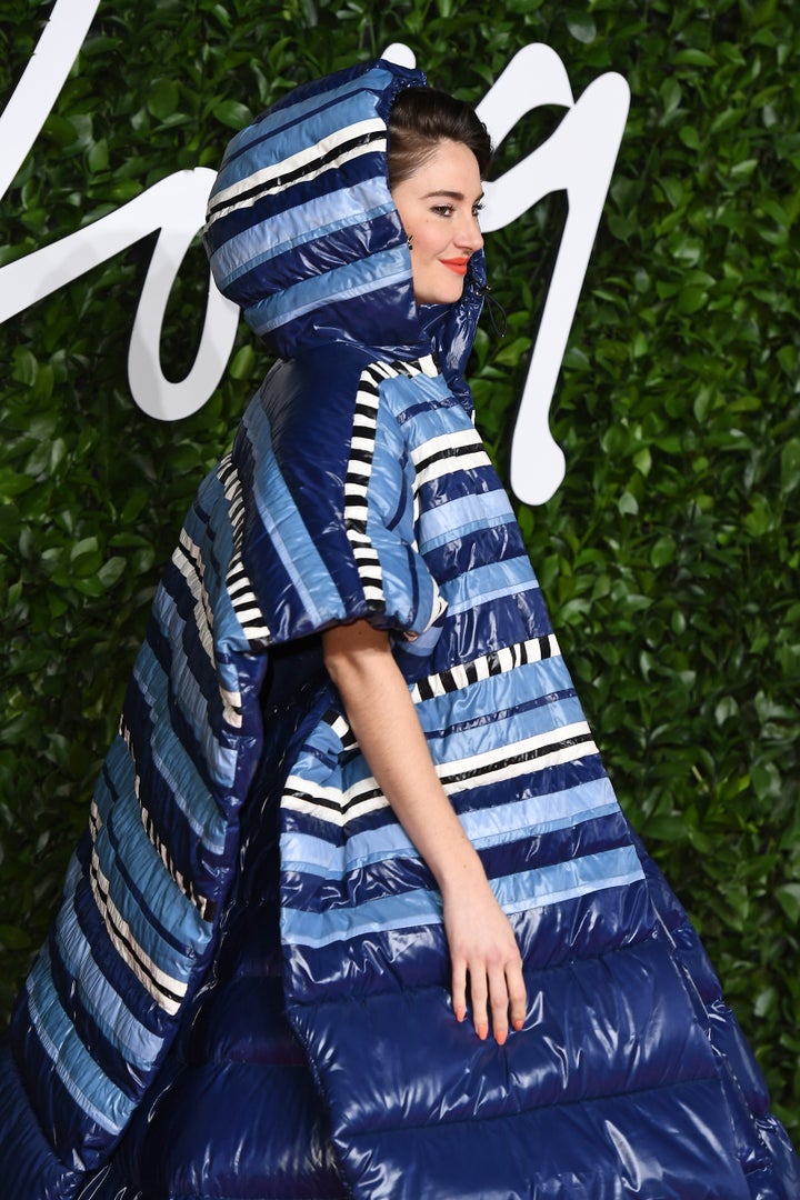 She showed off the hooded part of her ensemble on the red carpet. 