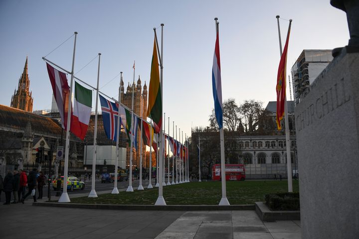 Flags of NATO members fly in Parliament Square, ahead of the summit held on Dec. 3 and 4 in London, Monday, Dec. 2, 2019. (AP Photo/Alberto Pezzali)