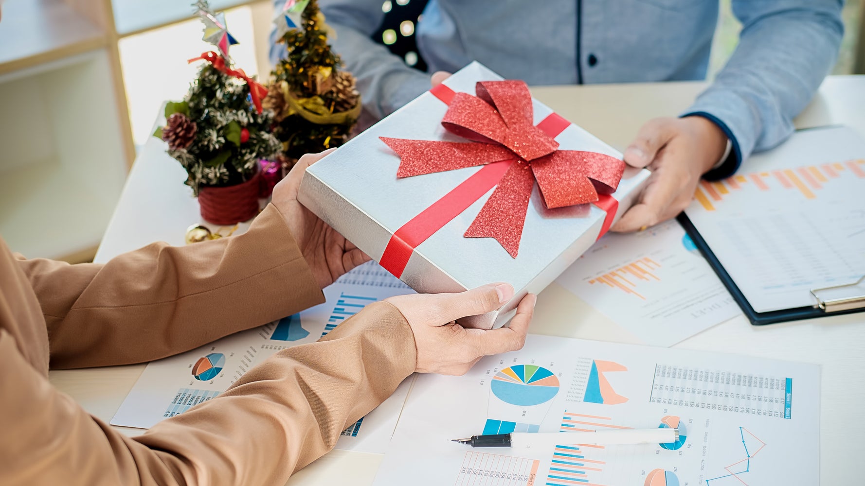 Before Buying Your Coworkers Holiday Gifts, Read What 9 Women