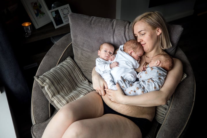 Ali O’Leary, 32, with triplets Lenny, Ted and Bruce.