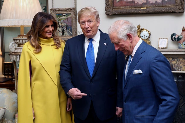 Britain's Prince Charles, right, poses for a photo with US President Donald Trump and first lady Melania,...