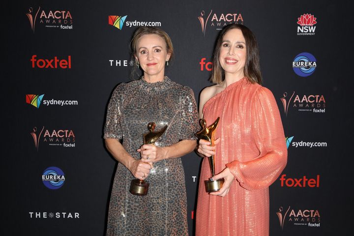 Sarah Scheller and Alison Bell pose with the AACTA Awards for Performance in a Television Comedy and Best Comedy Program.