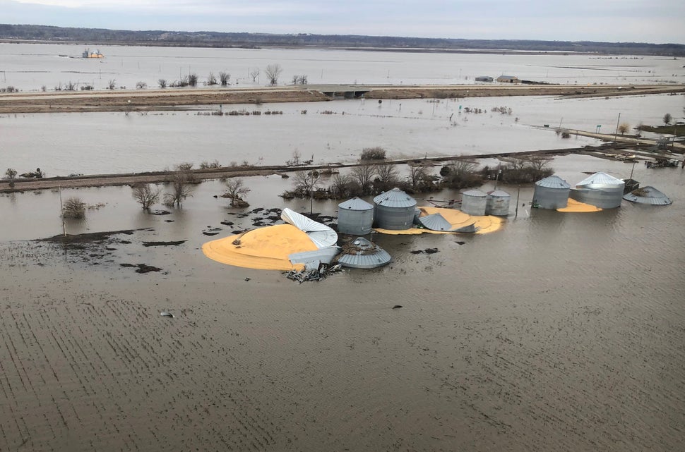 The contents of grain silos that burst from flood damage are shown in Fremont County, Iowa, March 29, 2019. The damage from f