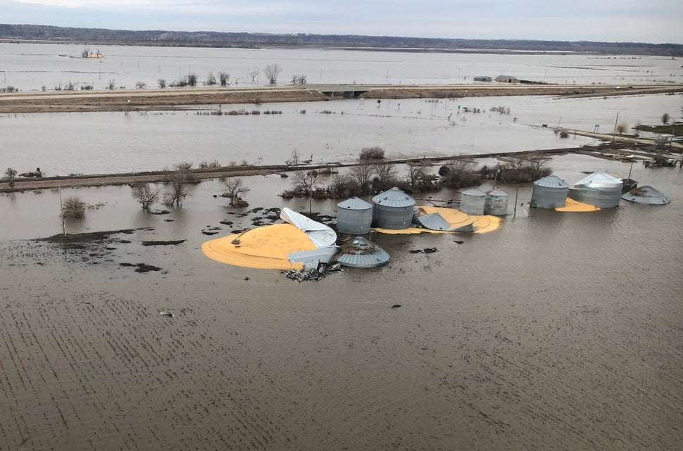 The contents of grain silos that burst from flood damage are shown in Fremont County, Iowa, March 29, 2019. The damage from flooding in the state is predicted to cost more than $2 billion.